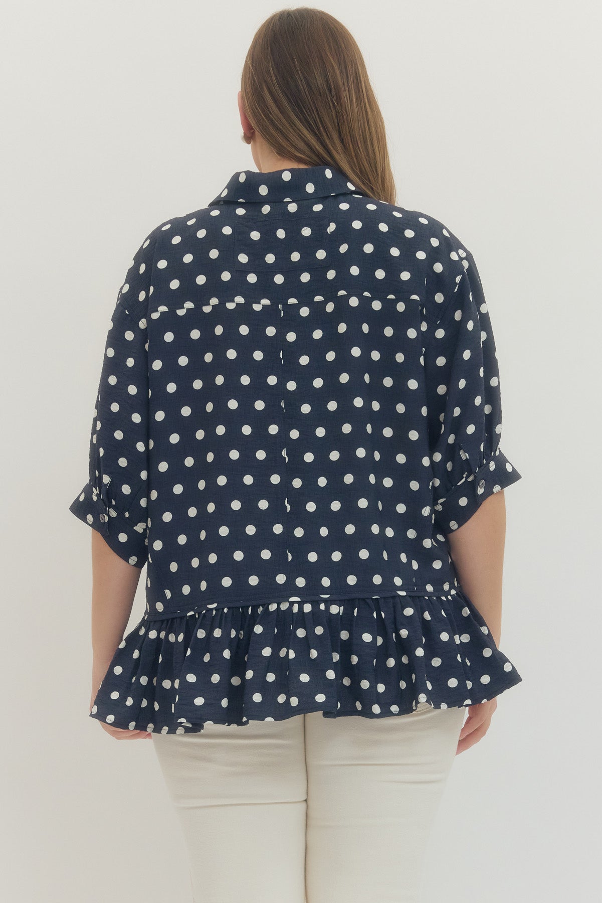 Navy Polka Dot Top with Ruffle Hem